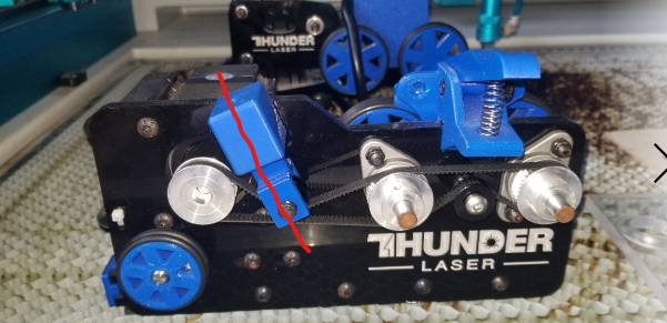 Tensioner mounted at extreme angle