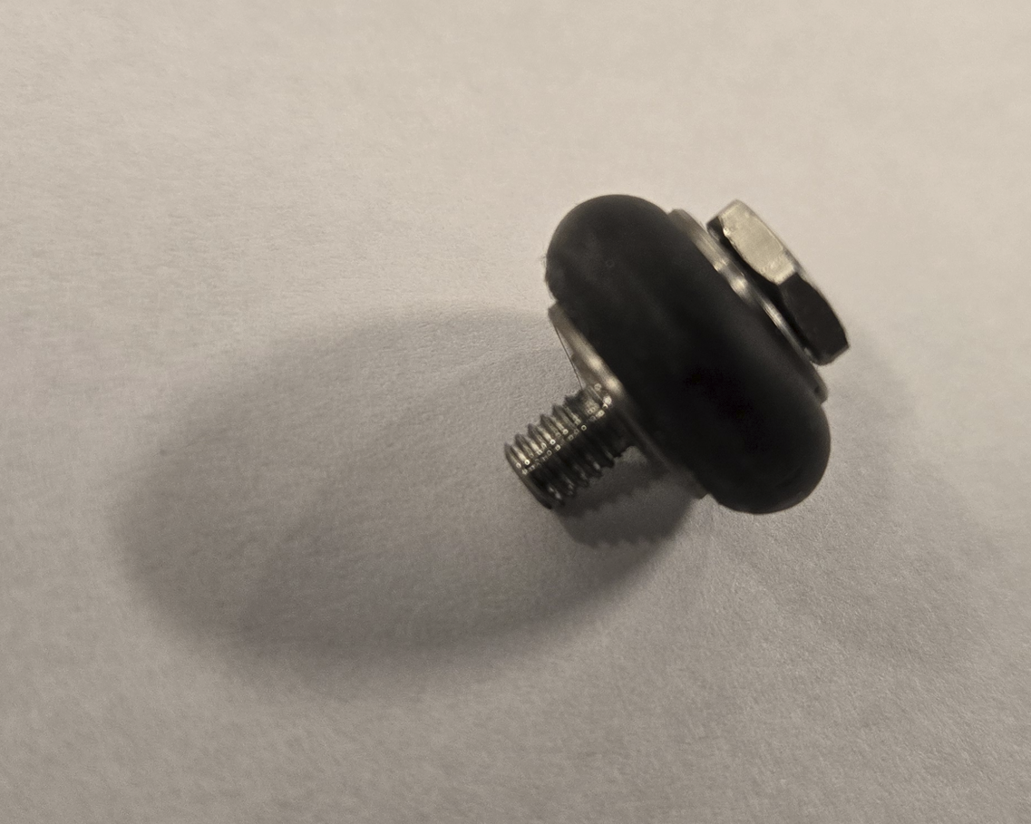 Bearing with shoulder bolt