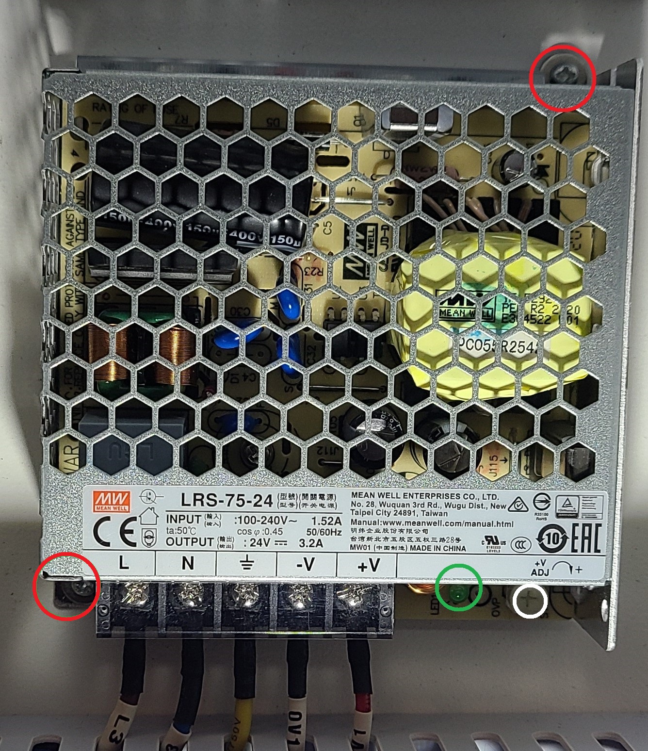 Screws holding the 24V power supply to the back panel