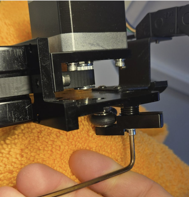 Reinstalling retaining bolt and washer